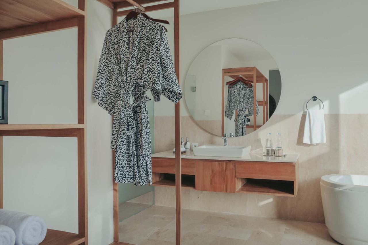 The Sebali Resort Ubud Eksteriør bilde A bathrobe hanging on a hanger